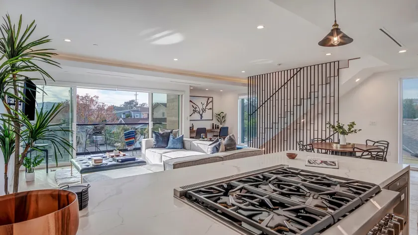 Modern 4-bedroom home with EV charging station - Image 1