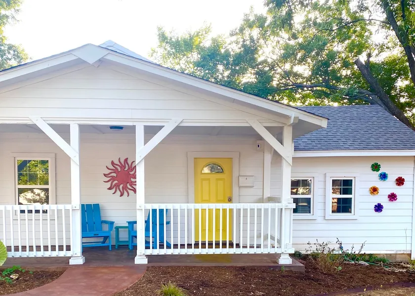 Whimsical cottage with picket fence near OU campus - Image 1