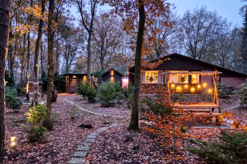 Lodge in a wooded area with Hottub & Sauna - Image 1