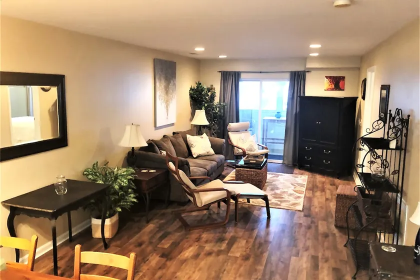 Charming Two Bedroom Condo on Bike Trail - Image 1