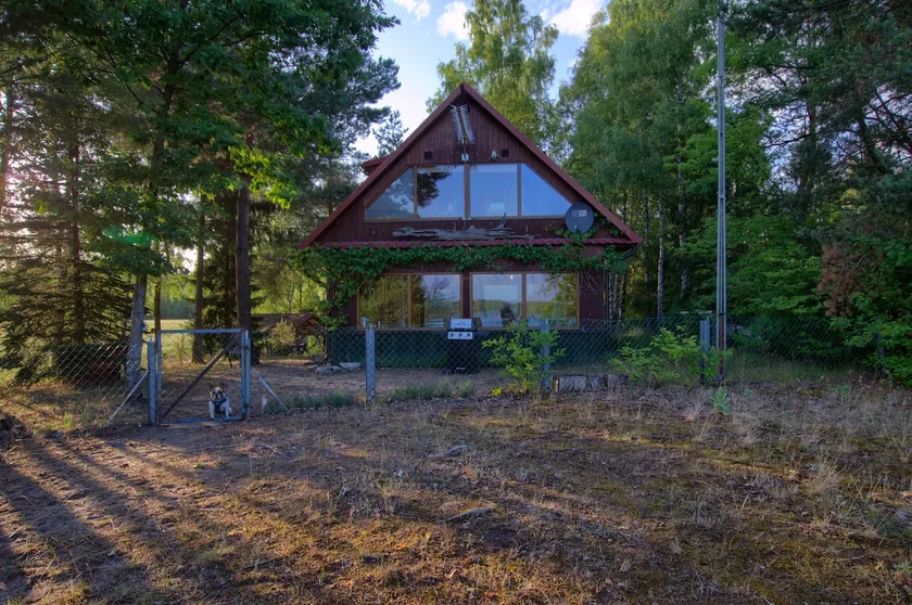 House in the woods by the lake - Image 1