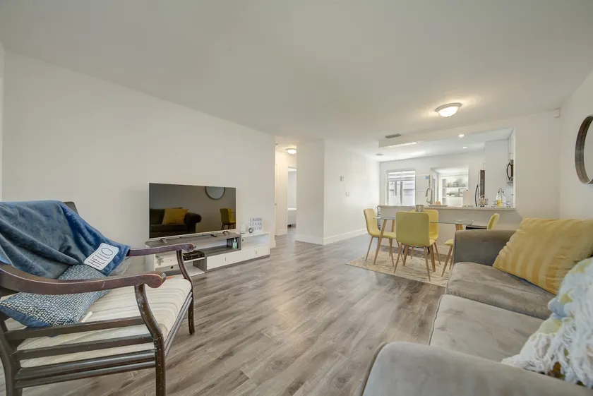 CHARMING 2 BEDROOM HOME WITH PARKING AT DOOR STEPS - Image 1