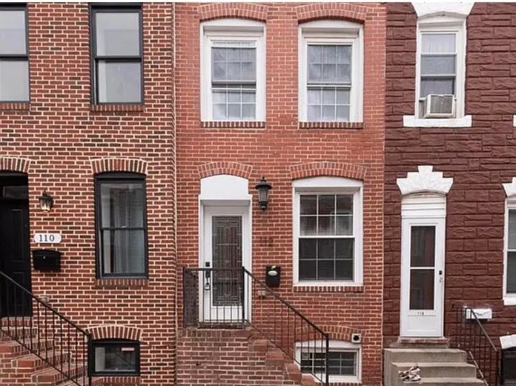 NEW LISTING! Trendy rowhouse in Patterson Park - Image 1