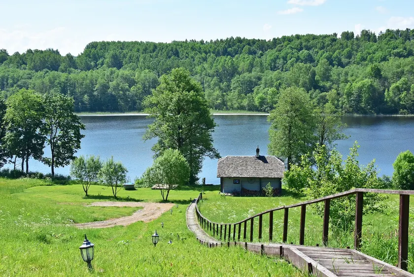 Cool hut on the shore of the lake with sauna, hot tub - Image 1
