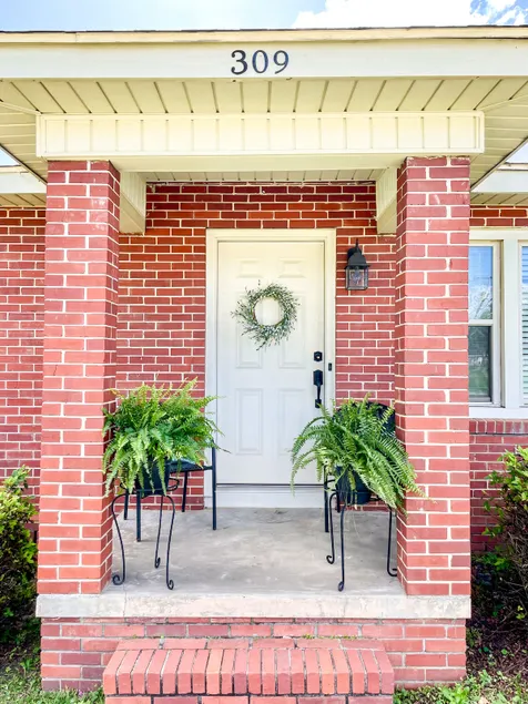 Stay Awhile | Peaceful Small-Town Escape - Image 1
