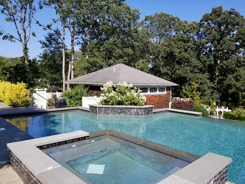 Bayfront 1BR/2BR detached guesthouse with pool - Image 1