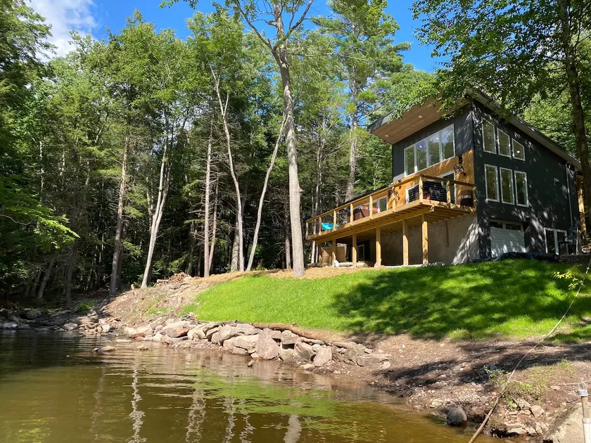 Secluded lakefront home With an EV charger - Image 1