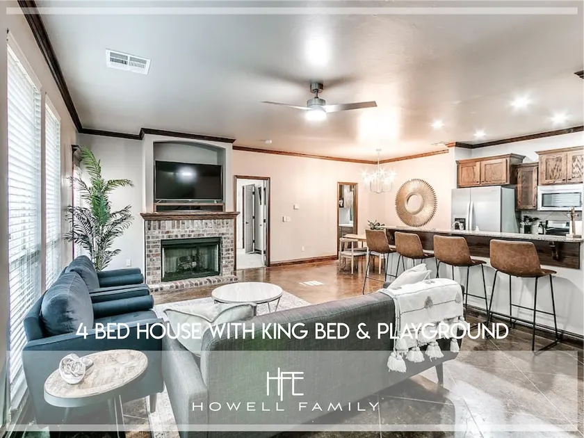 Spacious 4 Bed House With King Bed & Playground - Image 1