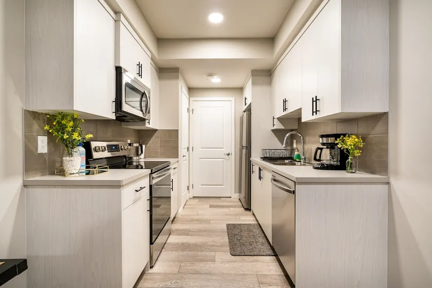 Newly built and tastefully furnished legal one bedroom private guest suit. - Image 1