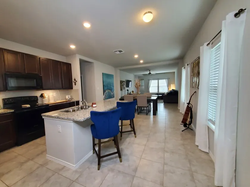 Modern 3-bedroom home with parking on premises. - Image 1