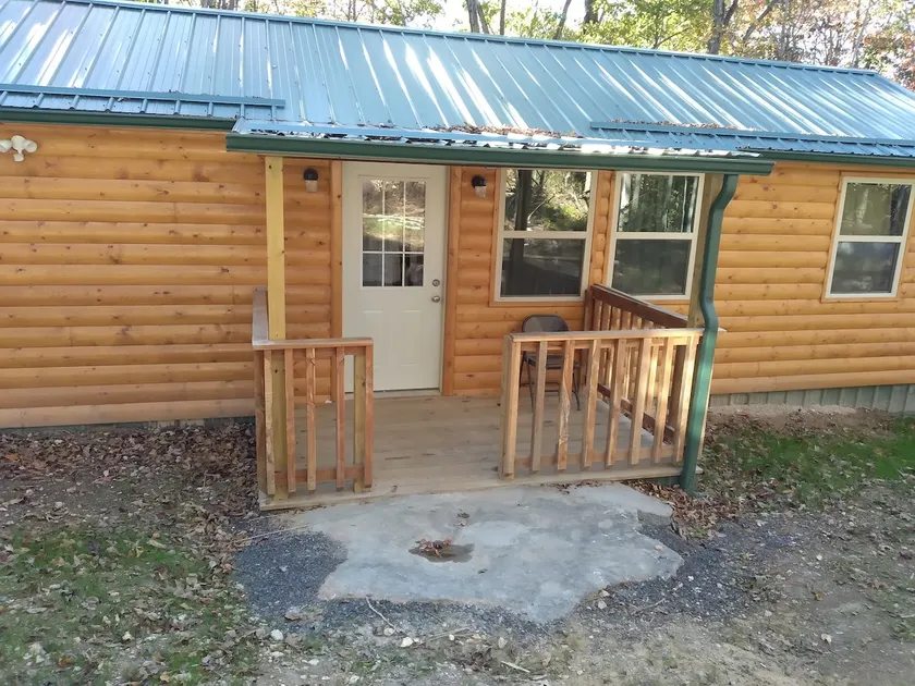 Cabin with a tree house on a working buffalo farm near the Buffalo River. - Image 1