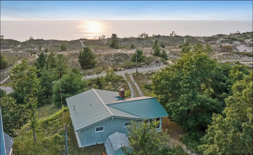 Lakefront Cottage with Retro Vibe, Modern Comforts - Image 1