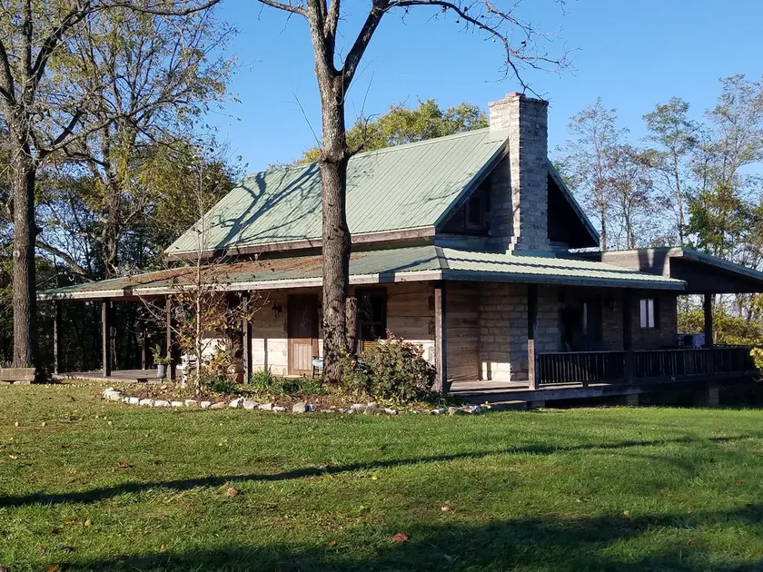 Historic Log Cabin on 200 acre farm, pasture and forest with panoramic views! - Image 1