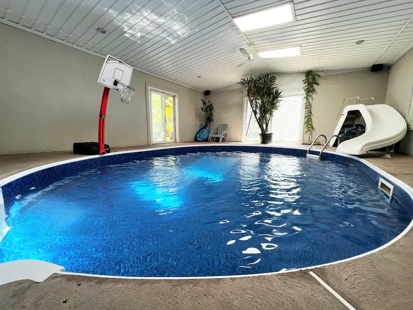 Cheerful 5 bedroom home | Heated Indoor Pool! - Image 1