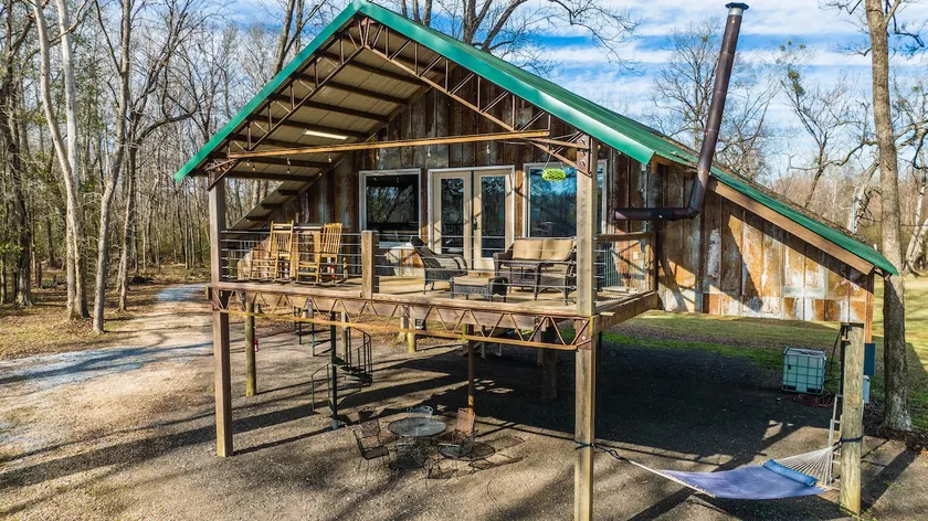 The Dirt Rd River Cabin - Image 1