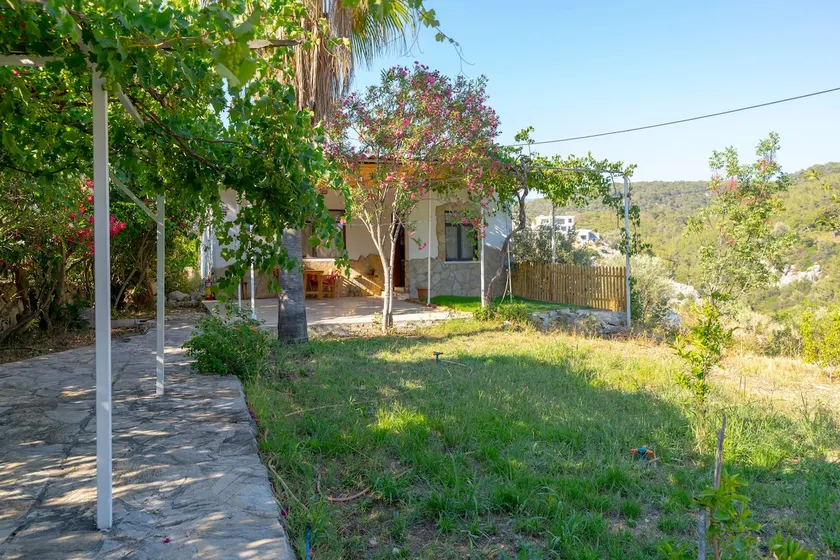 Stone house in a quiet and peaceful garden. - Image 1