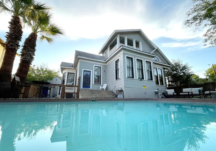 Sparkling pool • Historic 6-BR Oasis Near Downtown - Image 1