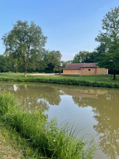 Cottage and pond - Image 1