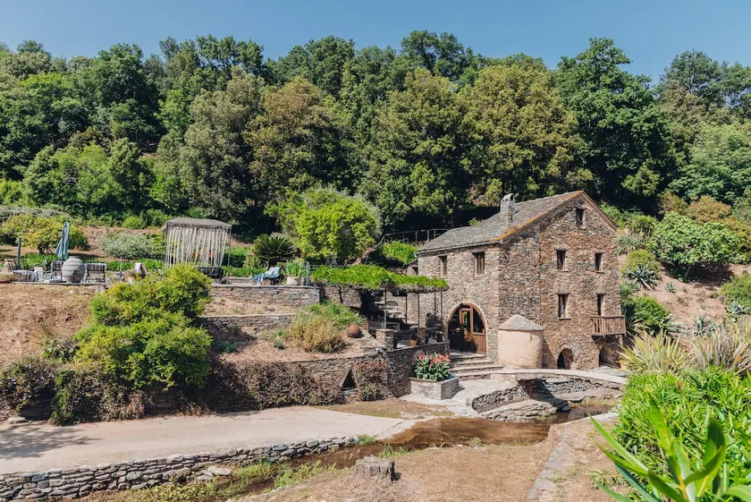Riverfront mill with pool - Image 1