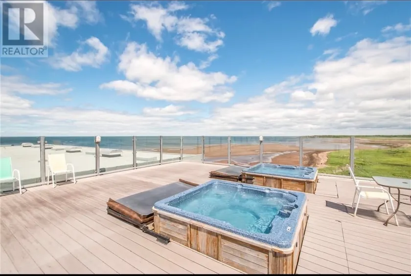 Lovely waterfront 2 bedroom condo with pool - Image 1