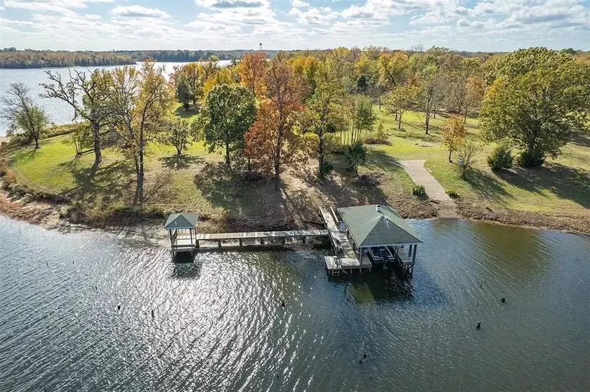 Entire lake house at Lake Fork with private bay, boat ramp, fishing light & 8 acres land - Image 1