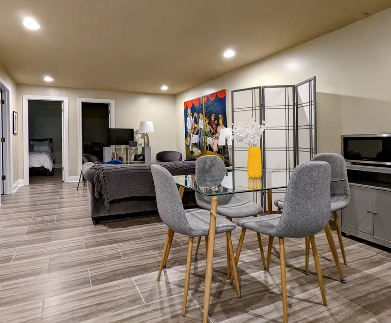 Lower-level apartment w 2 BRs and kitchenette - Image 1