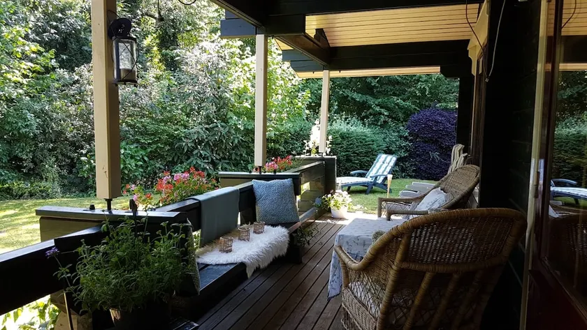Cozy Wooden House with a Porch on the Water! - Image 1