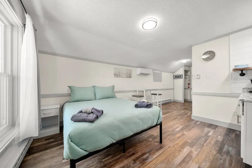DT TC Suite I Queen Bed I Walk Bars + Shops - Image 1