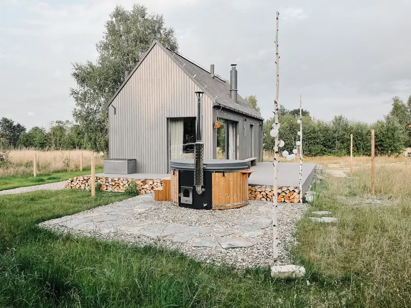 Popielato - a house with a hot tub and fireplace - Image 1