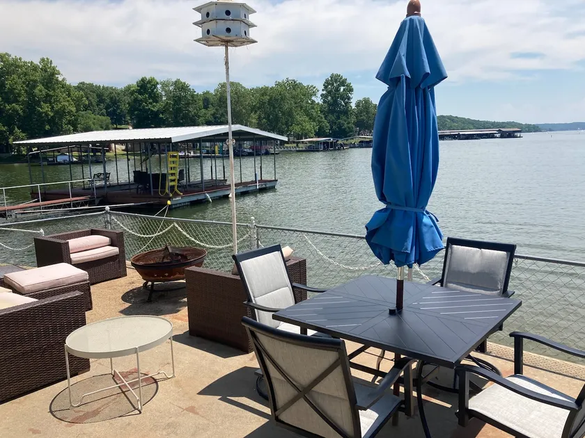 Lake front with view, dock and calm water - Image 1