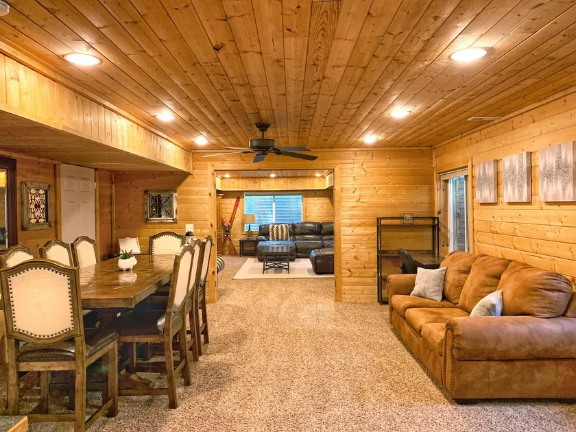 Cozy Cabin Themed Basement in Mountain Green - Image 1