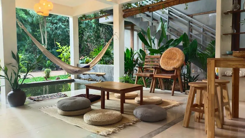 Tropical Cozy Home with Porch & Fish Pond - Image 1
