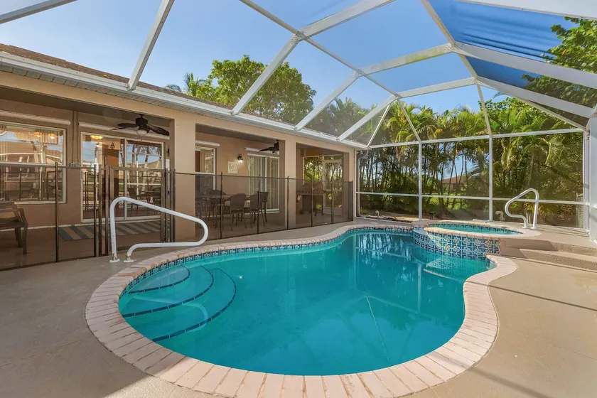 4 bedroom waterfront pool home - Image 1