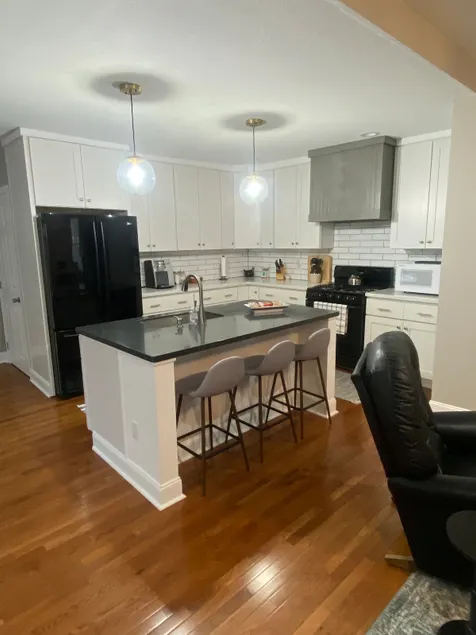 * Nicely renovated spacious home with large deck. - Image 1