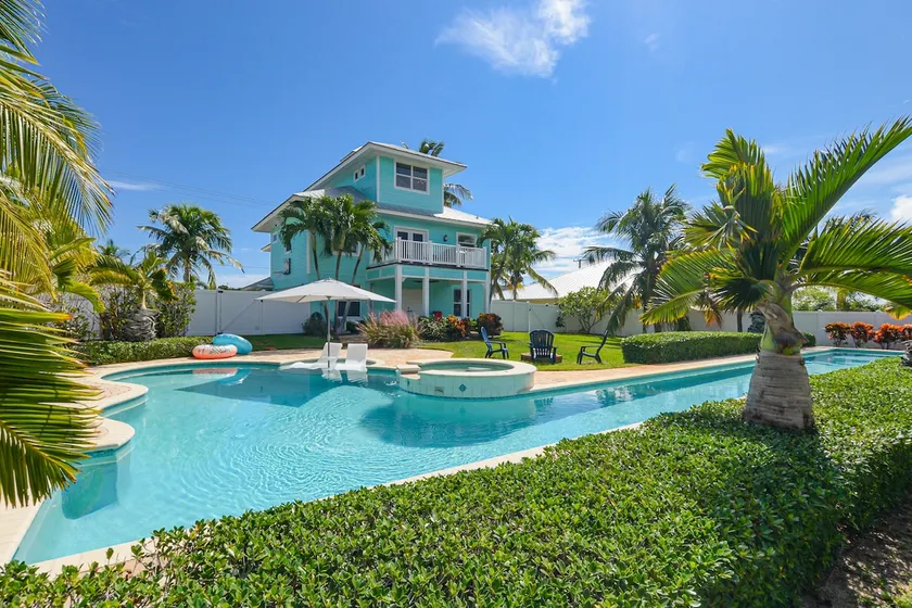 Stunning 4/3 w/ Heated Pool, Water View & Arcade! - Image 1