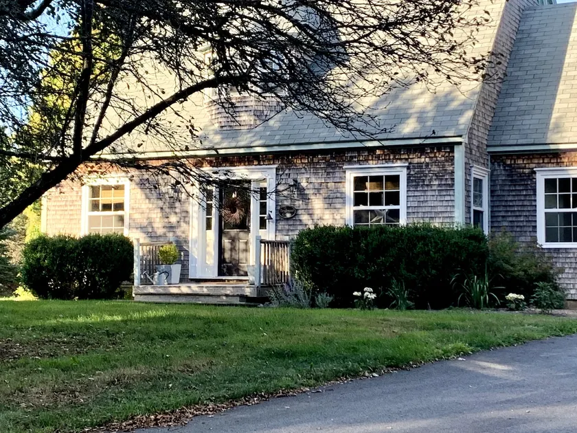 Storybook coastal farmhouse with ocean access - Image 1