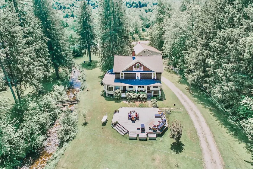 Riverfront history farmhouse in Oneonta NY - Image 1