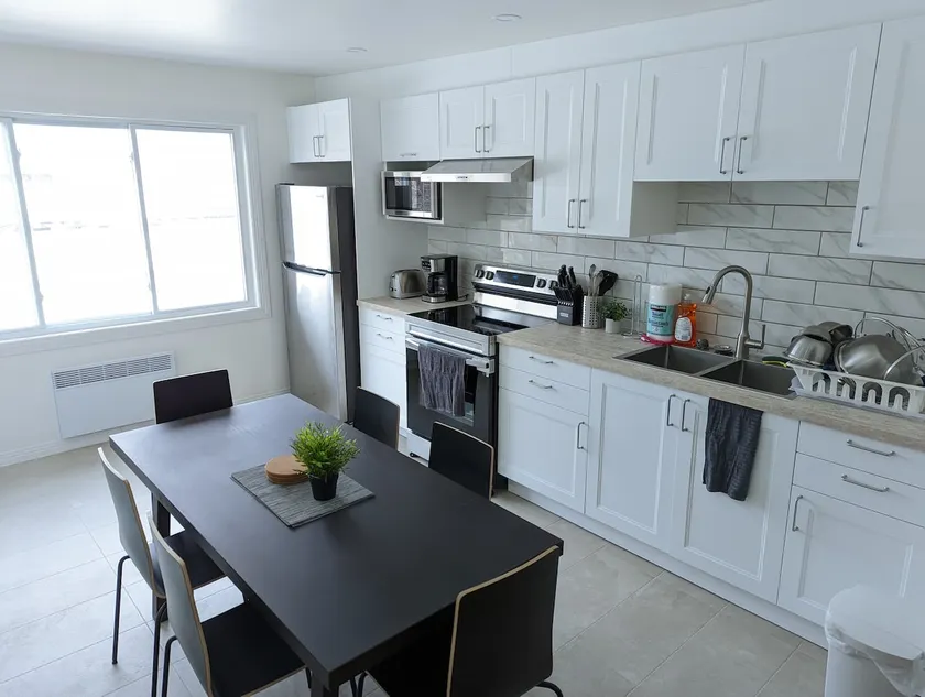 LOVELY 2 BEDROOM CONDO with FREE PARKING! - Image 1