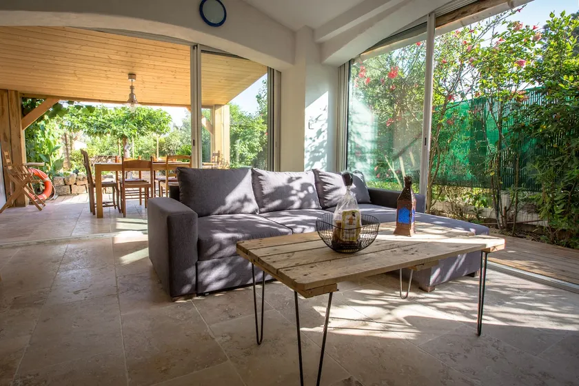 Beach house with a garden - Image 1
