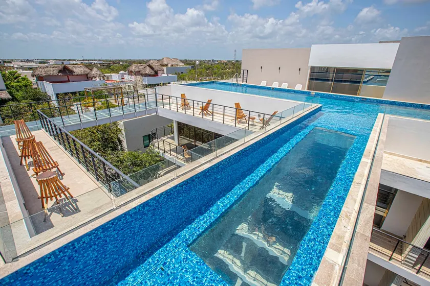 Epic Condo with amazing Rooftop Pool in Aldea Zama - Image 1
