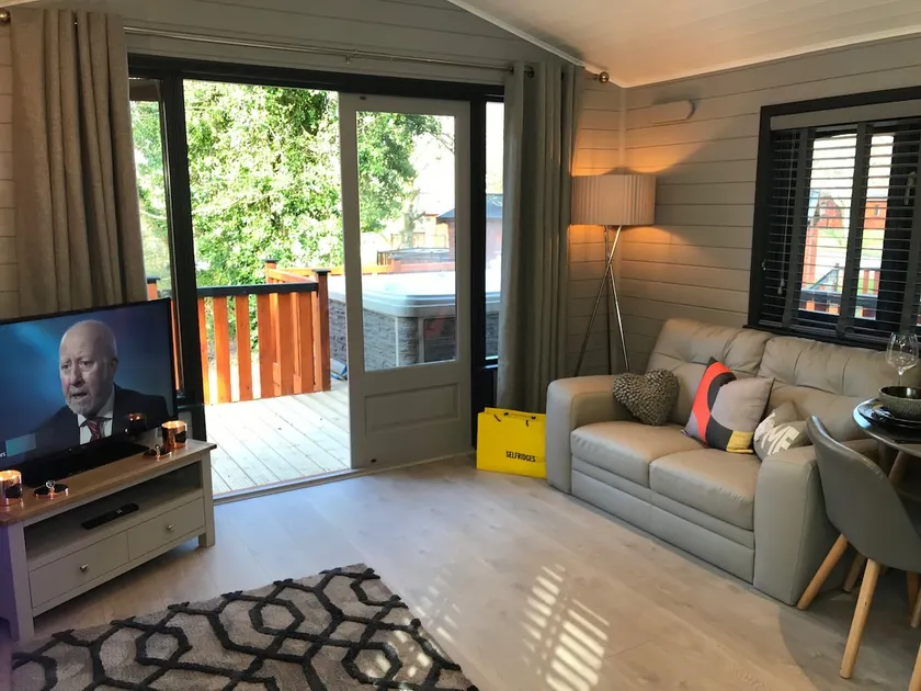 L11 - Riverside Lodge with Hot Tub in Snowdonia - Image 1