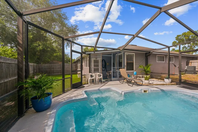 Sunny Florida home with a pool. - Image 1