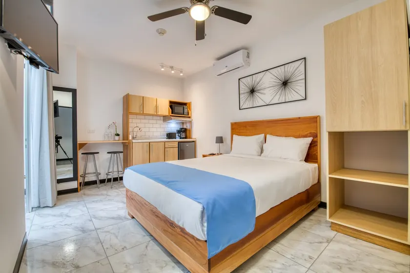 Stylish Downtown Studio Apartment with Patio & A/C! - Image 1
