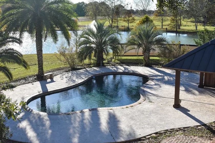 Youngsville Retreat- pool, private pond, outdoor fireplace - Image 1