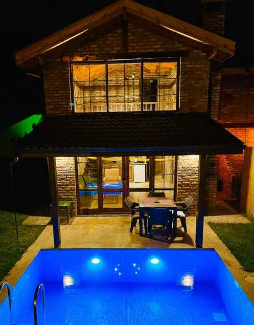 Antique stone cottage house with a warm pool - Image 1