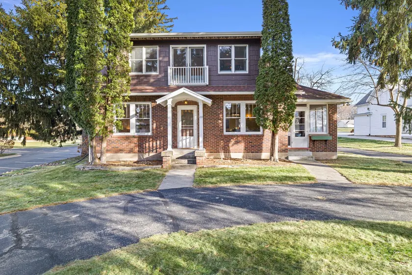 Red Brick Home Near Lake - Image 1