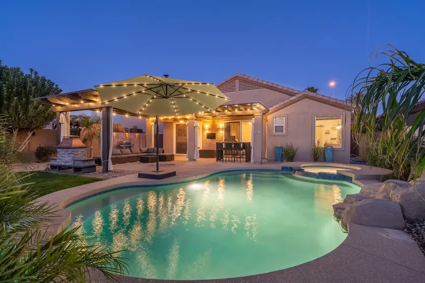 Waterfront Villa with Pool Hot Tub Lounge area - Image 1