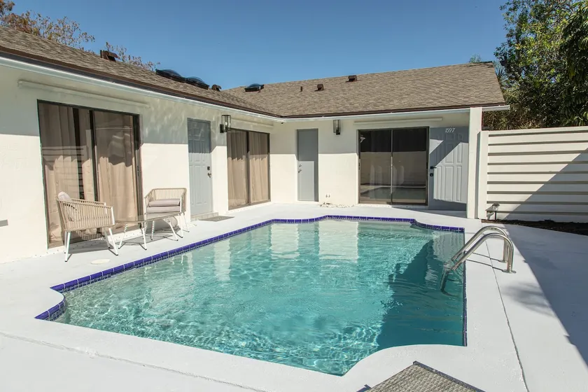 Modern Luxury Villa w/ Heated pool & patio  -6 min from WEF - Image 1