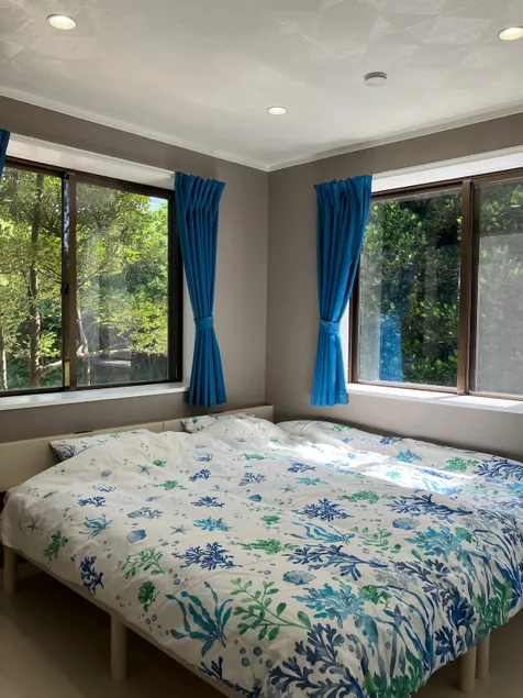 Hana Villa Bise no Ya, a short walk from Bisezaki Cape. A hideaway surrounded by Fukugi trees. Churaumi Aquarium within walking distance - Image 1