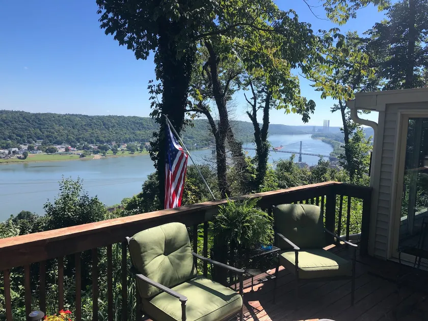 Nestled in the trees with river view and decking - Image 1